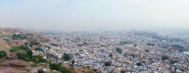 Panoramic view of Jodhpur city as seen from famous Mehrangarh fort, Jodhpur, Rajasthan, India. Blue sky in background. Mehrangarh Fort is UNESCO world heritage site popular amongst tourists worldwide.