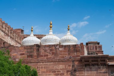 Ancient structures inside Mehrangarh fort, Jodhpur, Rajasthan, India. Famous architecture with intricate carvings and expansive courtyards. It is Unesco world heritage site, a popular tourist spot.