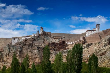 Basgo or Bazgoo, a village situated on the bank of the Indus river in Leh district, Ladakh, India. Ancient cultural and political centre, Basgo Monastery and Himalayan mountains. Blue sky bakcground.