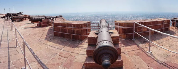 Panoramic image of Kilkila cannons on the top of Mehrangarh fort, overlooking Jodhpur for proctection since ancient times. Huge long barrel is a favourite tourist attraction. Jodhpur, Rajasthan,India.