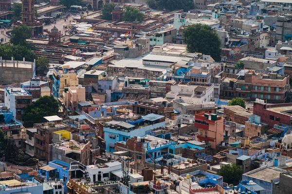 Aerial view of blue city, Jodhpur, Rajasthan,India. Orange sky background. Resident Brahmins worship Lord Shiva and painted their houses in blue as blue is his favourite colour. Hence named blue city.