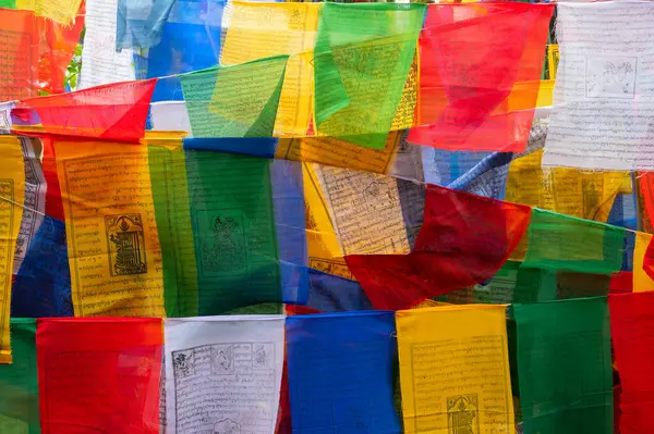 stock image Darjeeling,West Bengal,India-11.08.2023: Flags on stair cases in forest,way to Mahakal Temple or Mahakal Mandir, Hindu temple dedicated to God Shiva, an amalgamation of Hindu and Buddhist religions.