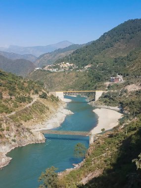 Holy Ganges or Ganga river , flowing through Himalayan mountians of Rishikesh, Uttarakhand, India.