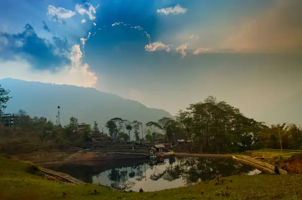 stock image Sunset sky over Chayatal or Chaya Taal, West Sikkim, India, Nature, silence and peace. Famous for Reflection of snow-capped Mount Kanchenjunga and Kabru on lake water, Himalayan mountains.