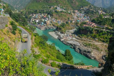 Curvy road at Devprayag, Godly Confluence,Garhwal,Uttarakhand, India. Here Alaknanda meets the Bhagirathi river and both rivers thereafter flow on as the Holy Ganges river or Ganga.