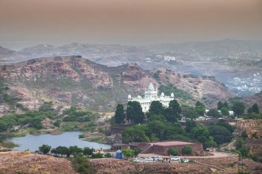 View of Jaswant Thada, cenotaph, from Mehrangarh fort Jodhpur,Rajasthan, India, Thada was built by Maharaja Sardar Singh, built of marble which emit a warm glow when illuminated by the Sun. clipart