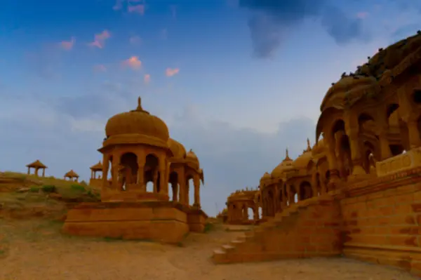 stock image Blurred image of Bada Bagh or Barabagh, means Big Garden, is a garden complex in Jaisalmer, Rajasthan, India, for Royal cenotaphs, or chhatris, of Maharajas means Kings of Jaisalmer state.