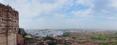 Panoramic view of Jodhpur city seen from famous Mehrangarh fort, Jodhpur,Rajasthan, India. Blue sky in the background. Mehrangarh Fort is UNESCO world heritage site popular amongst tourists worldwide.