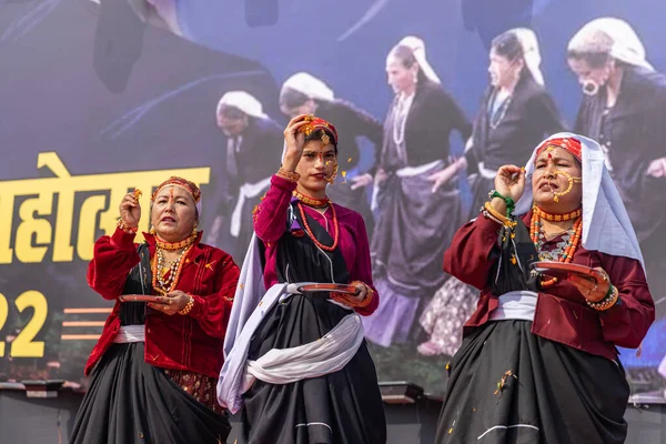 stock image Tribal women of Uttarakhand wearing traditional attire and dancing in their village at Haldwani, Uttarakhand, India on 17 January 2023