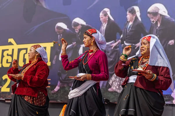 stock image Tribal women of Uttarakhand wearing traditional attire and dancing in their village at Haldwani, Uttarakhand, India on 17 January 2023