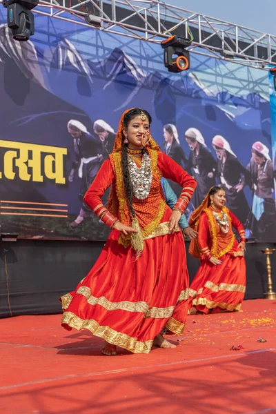 stock image Tribal women of Uttarakhand wearing traditional attire and dancing in their village at Haldwani, Uttarakhand, India on 17 January 2023