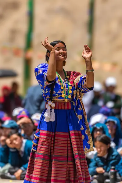 stock image A young Nepali girl performing traditional dance sequence wearing traditional costumes at Leh, Ladakh India on 23 May 2024.