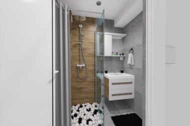 Küçük bir banyo için modern minimalist tasarım. Doğal siyah ve beyaz renkler ve ahşap benzeri malzemeler kullanarak..