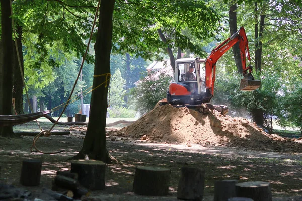 stock image the excavator is working with a large bucket