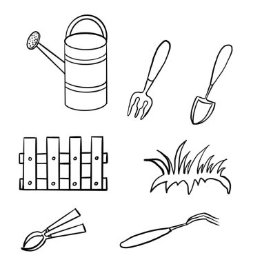 gardening,gardening tools, shovel,rake,watering can,wooden fence,grass,harvest box,field work,seasonal work in the garden and vegetable garden,autumn summer and spring work in the garden