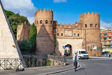 Rome, Italy - October 8, 2022: Porta San Paolo in the Ostiense square, 3rd century city gate, part of the Aurelian wall at Aventine hill. The Museum of the Ostian Way.