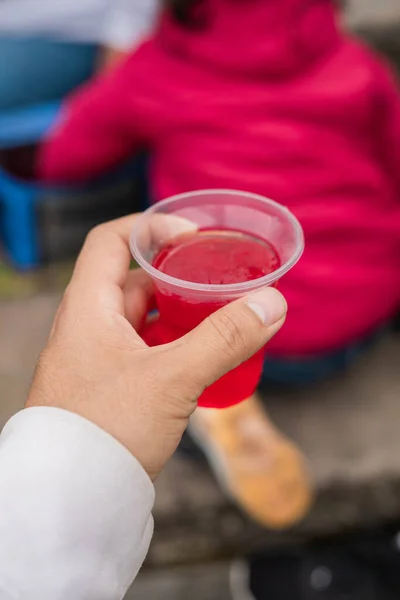 stock image plastic cup with delicious red colored jelly, healthy food, sweet dessert