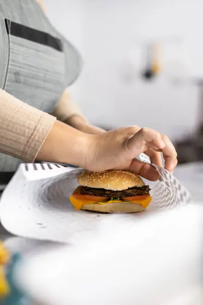 delicious hamburger, unhealthy food and carbohydrate, fast food preparation, restaurant and delivery, background and textures