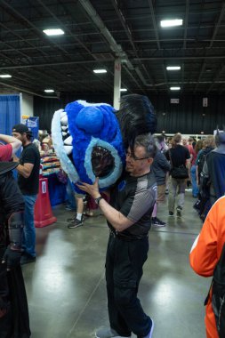 Motor City Comic Con sunuculuğunu Novi, Michigan 'daki Suburban Collection Showplace üstlendi.