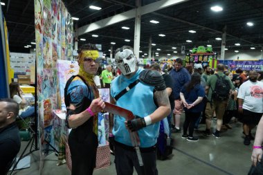 Motor City Comic Con sunuculuğunu Novi, Michigan 'daki Suburban Collection Showplace üstlendi.