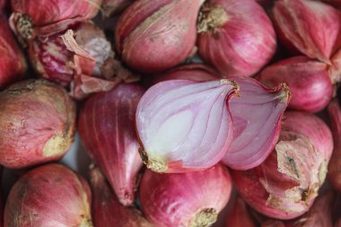 Unpeeled red shallot on white background, flat lay clipart