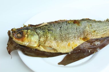 Bandeng Presto is milk fish cooked with high pressure cooker to make fish bone become softer. Signature dish from Juwana and Semarang, Indonesia. isolated on white background clipart