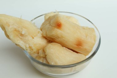 Tapai is fermentation of cassava with yeast. Indonesian snack. Isolated on white background clipart