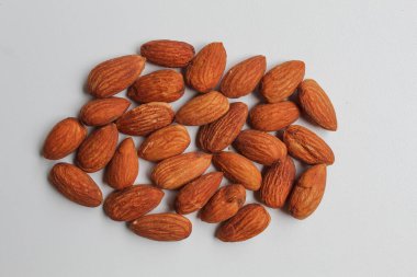 Roasted almond on white background clipart