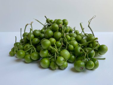 Fruit of Solanum nigrum, the European black nightshade or leunca, isolated on white background clipart