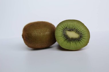 Halved kiwi fruit isolated on white background clipart