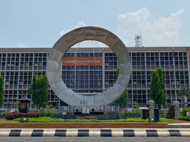 Semarang, Indonesia - December 24th 2023: Kilometer Zero Monument of Semarang City, marked by an iconic round water fountain clipart