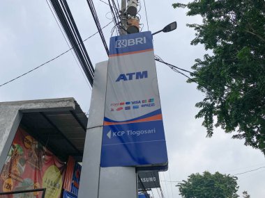 Semarang, Indonesia - February 24th 2024: Bank BRI is a state owned enterprise bank in Indonesia, specialises in small scale and microfinance clipart