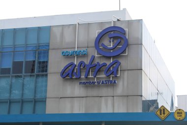 Astra Insurance front office building. Semarang, Indonesia, December 25th 2022 clipart