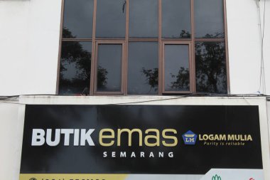 Butik Emas by Antam building, sell pure gold. Semarang, Indonesia, December 25th 2022 clipart