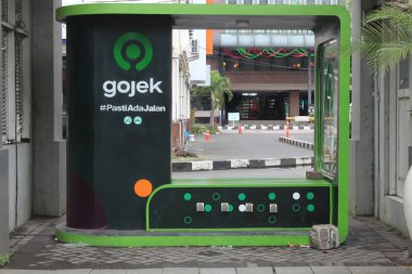 Gojek pck-up point at DP Mall Semarang. Semarang, Indonesia, December 25th 2022 clipart