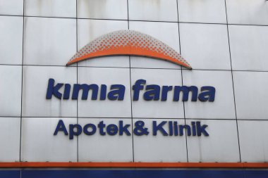 Kimia Farma Pharmacy and Clinic, front view building. Semarang, Indonesia, December 25th 2022 clipart