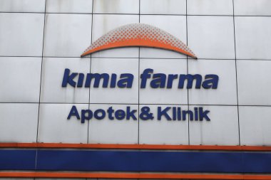 Kimia Farma Pharmacy and Clinic, front view building. Semarang, Indonesia, December 25th 2022 clipart