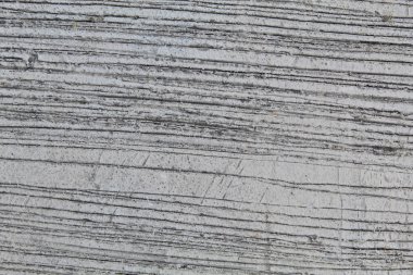 Beton duvardaki çizgilerin dokusu