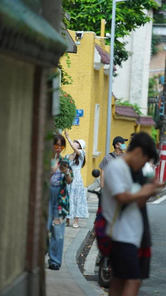 stock image The city street view with the mask people walking on the road during the Convid 19