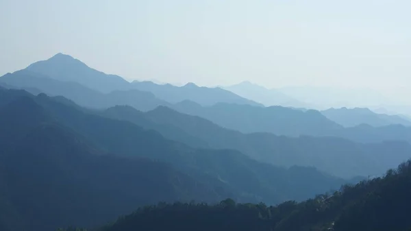 stock image The beautiful mountains view from the top of the hill in spring