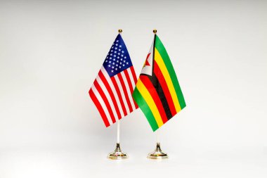 Arka planda ABD ve Zimbabwe eyalet bayrakları var. Bayraklar.