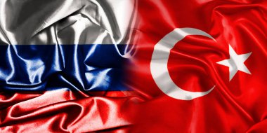 Rusya ve Türkiye 'nin ulusal bayrakları bir araya getirilerek yan yana çırpınan bir pamuk zemin üzerinde yerleştirildi.
