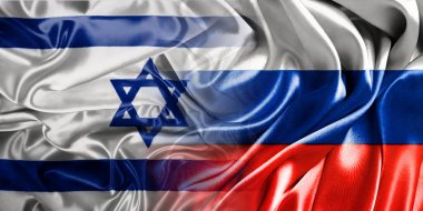 Rusya ve İsrail 'in ulusal bayrakları bir araya getirilip yan yana çırpınan pamuk bir zemine konur..