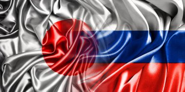 Rusya ve Japonya 'nın ulusal bayrakları birleştirilip yan yana çırpınan bir pamuk zemin üzerinde yerleştirilmiştir..