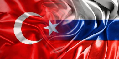 Rusya ve Türkiye 'nin ulusal bayrakları bir araya getirilerek yan yana çırpınan bir pamuk zemin üzerinde yerleştirildi.