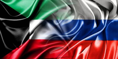 Rusya ve Kuveyt 'in ulusal bayrakları bir araya getirilip yan yana çırpınan bir pamuk arkaplanda yerleştirilmiştir..