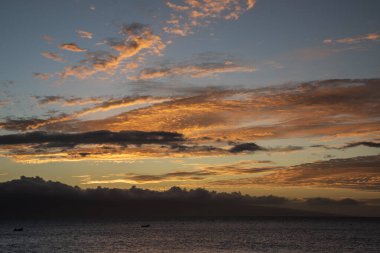 Maui, Hawaii.  A beautiful sunset over the Pacific Ocean at dusk.