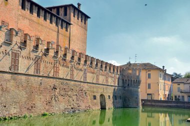 Fontanellato, Parma, Emilia-Romagna, Italy. Rocca Sanvitale. The Sanvitale fortress, also known as Fontanellato castle, is a medieval castle entirely surrounded by a moat still filled with water.