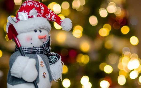 stock image Snowman with gold light background Christmas theme.