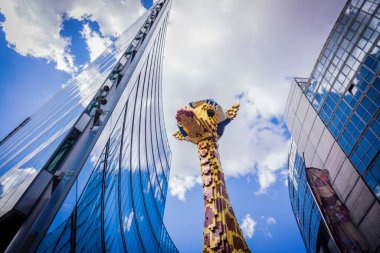 giant giraffe built with Lego pieces, Potsdamer Platz buildings, Berlin, germany, europe